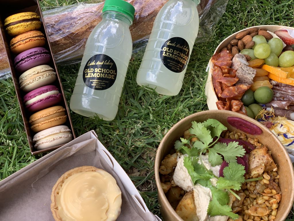 Macarons, baguette, lemonade drinks, charcuterie, a grain filled salad and lemon tarts were all included in the Mystery Picnic