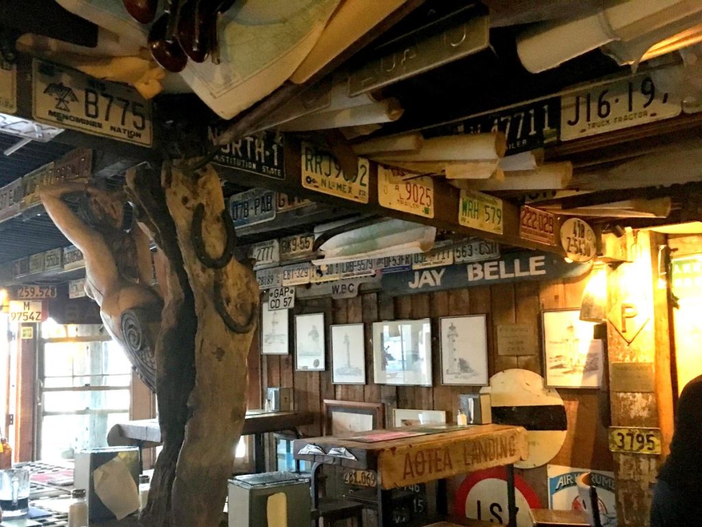 Inside of Swashbucklers Restaurant in Auckland showing the interesting decoration of licence plates