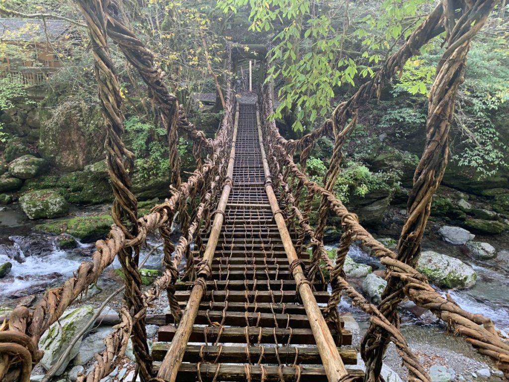 Bridge over a river in the Iya Valley, with slats bound together with vines