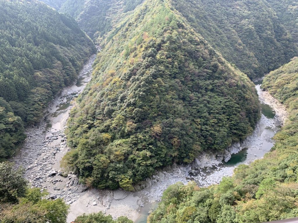 Famous view of a mountain with the river carving around it in a U, like the Japanese letter hi in Iya Valley, Japan