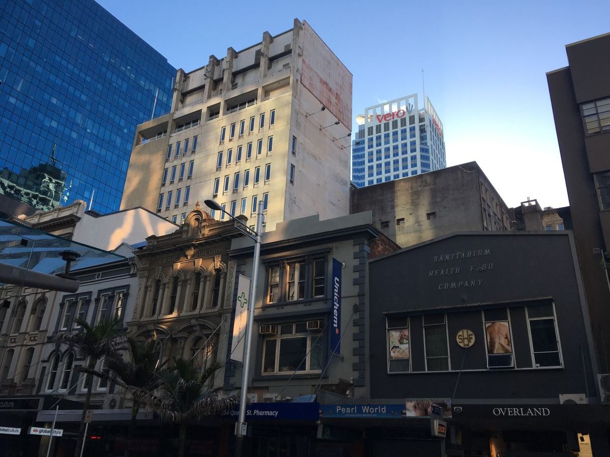 View of the tops of buildings in Queen Street, Auckland.