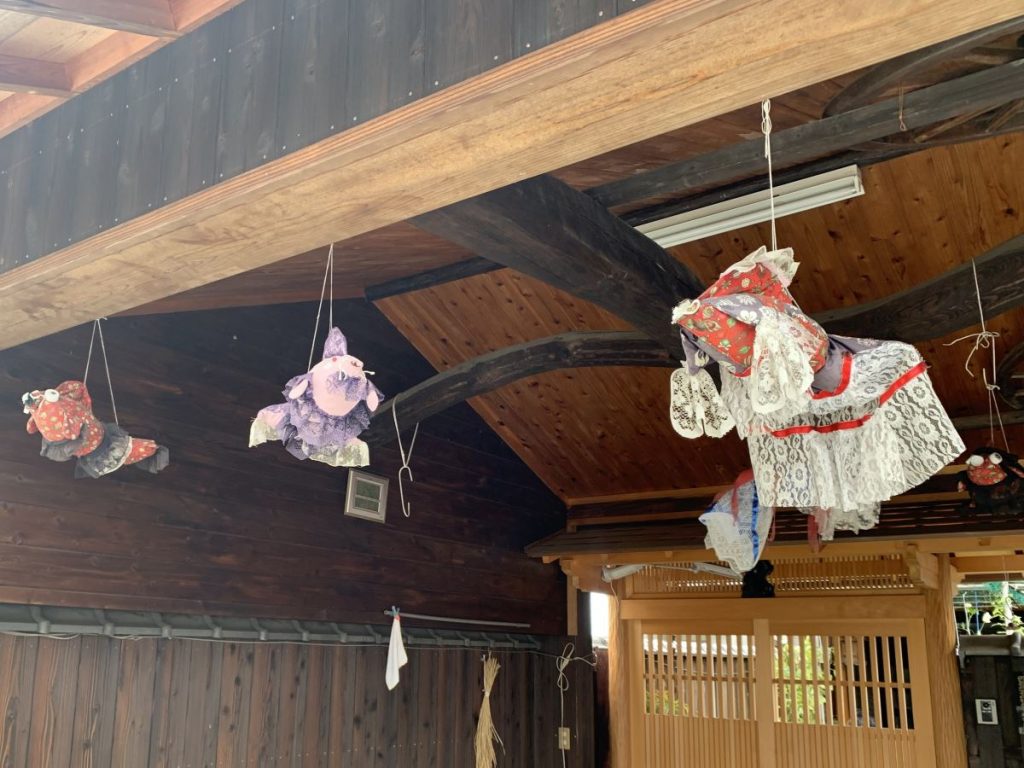 Cute handmade fish hang from a garage in Yamato Koriyama near Nara