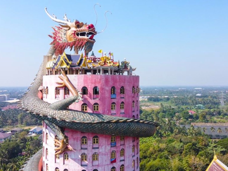 giant dragon on top of Wat Samphran Bangkok