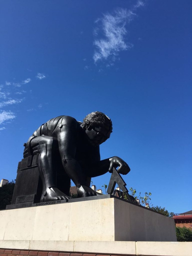 Close up of St Isaac Newton's Statue in Kings Cross london